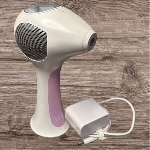 Tria White and Pink Hair Removal Device